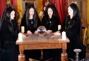 The Four Who Speak as One gather around a crystal ball on  Sleepy Hollow.