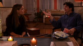 Professor Wilding and Joey Potter sit in candlelight on Dawson's Creek