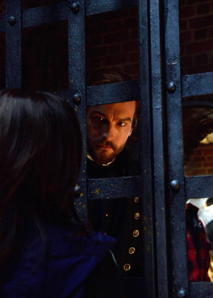 Captain Ichabod Crane visits Abbie Mills in jail when she time travels back to 1781 on the "Tempus Fugit" episode of Sleepy Hollow