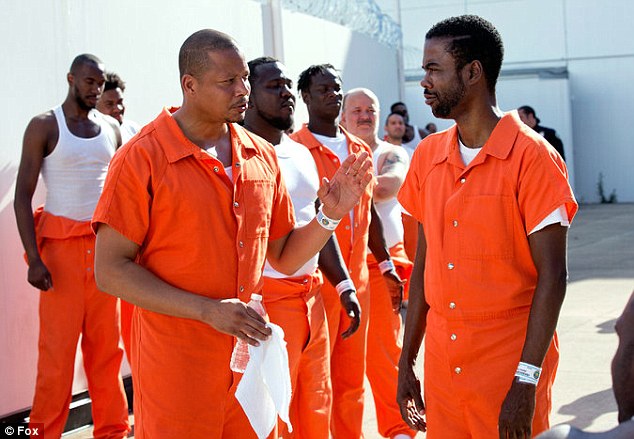 Chris Rock as Frank Gathers in the prison yard with Lucious on Empire