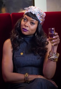 Cookie (Taraji P. Henson) wears a headscarf and holds a champagne glass on Empire episode, "Poor Yorick."