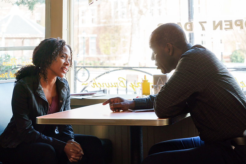 Abbie chats with her father, Ezra, in a coffee shop on Sleepy Hollow