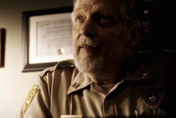 Sheriff August Corbin (Clancy Brown) sits in his office on Sleepy Hollow TV.