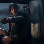 Jamie holds a gun in Outlander
