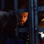 Captain Ichabod Crane visits Abbie Mills in jail when she time travels back to 1781 on the "Tempus Fugit" episode of Sleepy Hollow