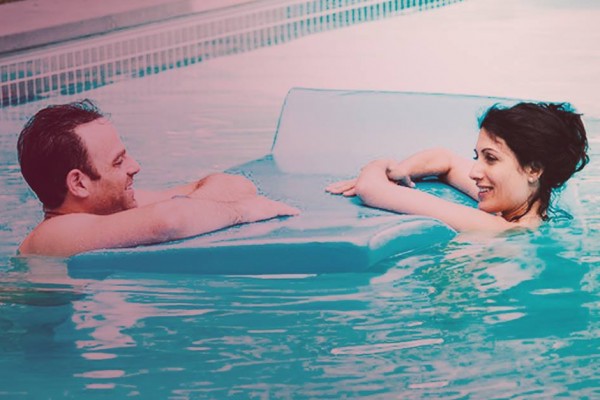 Abby and Jake in the pool on Girlfriends' Guide to Divorce